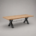 Table à manger rectangulaire plateau bois effet chêne pieds en acier croisés noir 180 cm x 90 cm x 75 cm